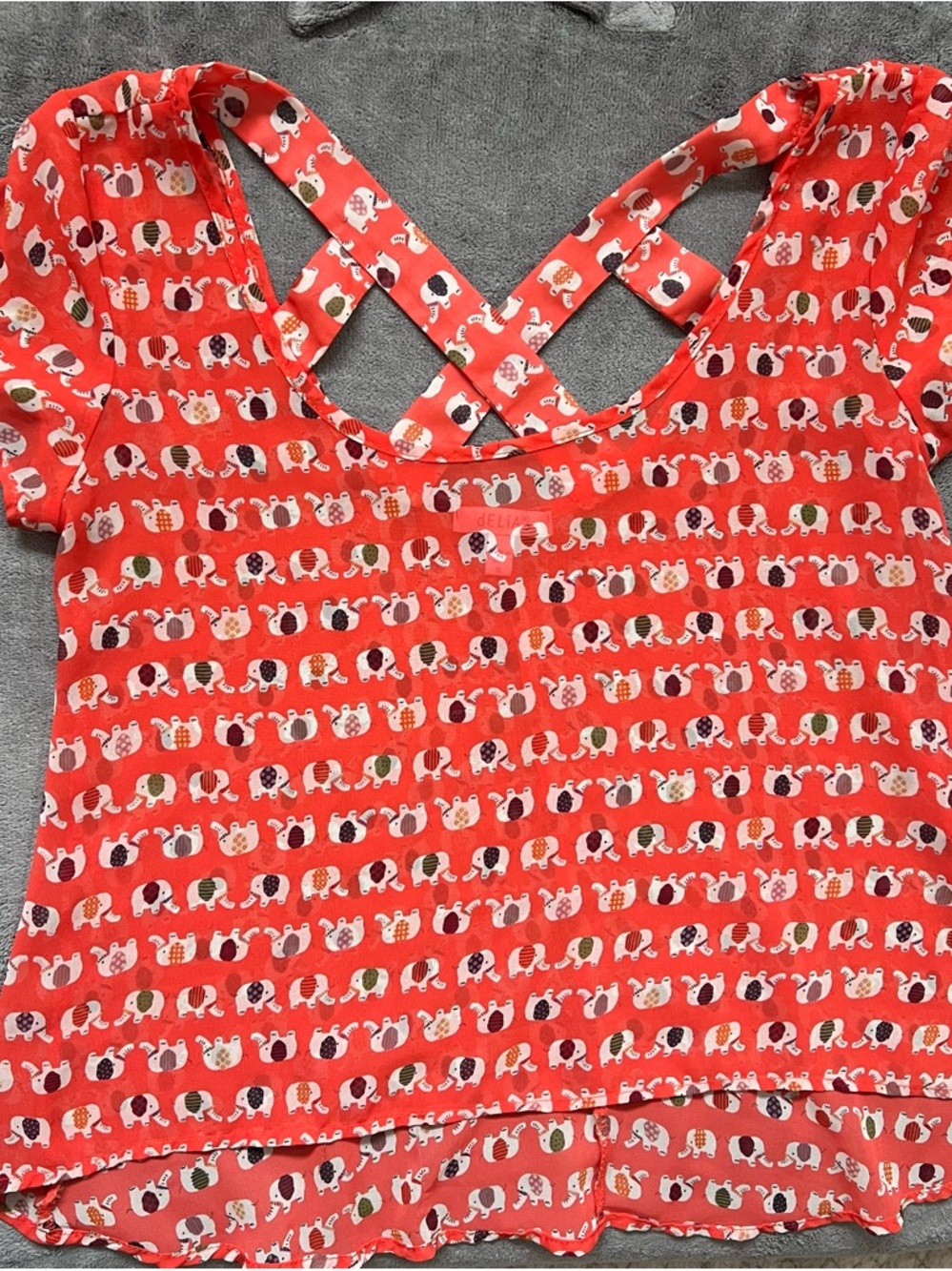 dELiA*s Junior’s Coral Elephant Print Hi-Low Criss-Cross Back Short Sleeve Top S